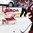COLOGNE, GERMANY - MAY 6: Denmark's Sebastian Dahm #32 looks to make the save on the shot from Latvia's Andris Dzerins #25 during preliminary round action at the 2017 IIHF Ice Hockey World Championship. (Photo by Andre Ringuette/HHOF-IIHF Images)

